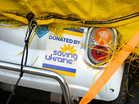 A sticker reading "donated by saving Ukraine" is seen on an electric scooter in Warsaw, Poland on 12 October, 2024. (