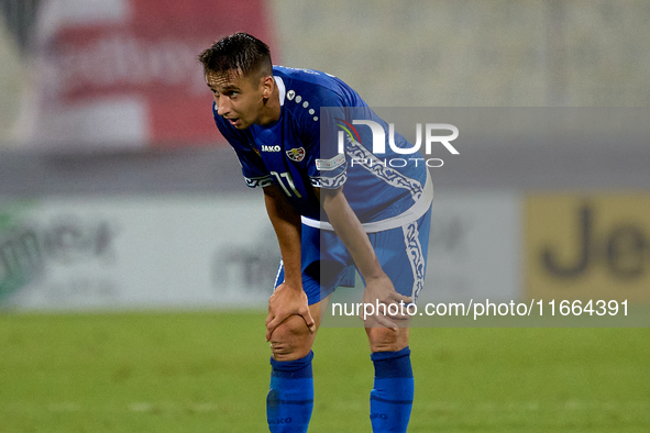 In Ta' Qali, Malta, on October 13, 2024, Mihail Caimacov of Moldova reacts in disillusion during the UEFA Nations League, League D, Group D2...