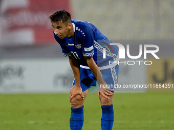 In Ta' Qali, Malta, on October 13, 2024, Mihail Caimacov of Moldova reacts in disillusion during the UEFA Nations League, League D, Group D2...