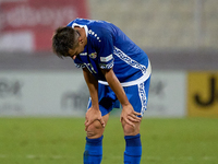 In Ta' Qali, Malta, on October 13, 2024, Mihail Caimacov of Moldova reacts in disillusion during the UEFA Nations League, League D, Group D2...