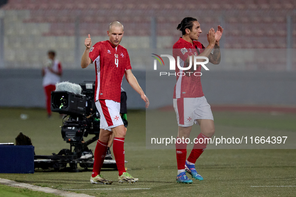 In Ta' Qali, Malta, on October 13, 2024, Gabriel Mentz (left) and Kurt Shaw (right) of Malta react after being substituted during the UEFA N...