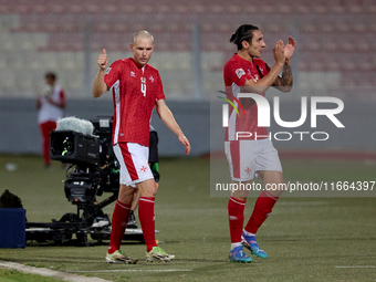 In Ta' Qali, Malta, on October 13, 2024, Gabriel Mentz (left) and Kurt Shaw (right) of Malta react after being substituted during the UEFA N...