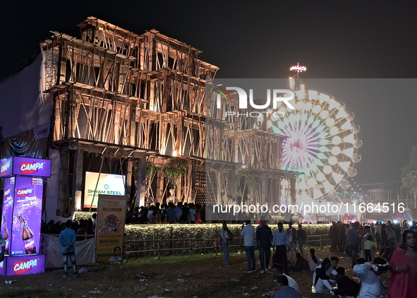 Visitors gather near the ground on the final day of Durga Puja in Siliguri, India, on October 13, 2024. 