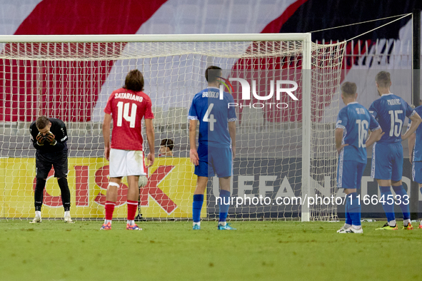 In Ta' Qali, Malta, on October 13, 2024, Moldova goalkeeper Dumitru Celeadnic reacts in disillusion after conceding a penalty during the UEF...