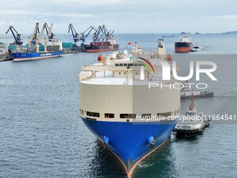 Foreign trade vessels dock to load and unload cargo at Yantai Port in Yantai, Shandong province, China, on October 14, 2024. On October 14,...