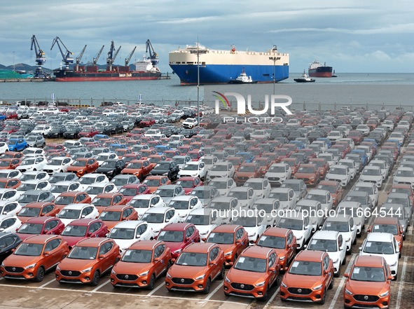 Chinese-made cars wait to be loaded for export at Yantai Port in Yantai, Shandong province, China, on October 14, 2024. On October 14, 2024,...