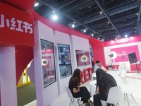 Visitors visit the stand of Little Red Book at an exhibition in Hangzhou, Zhejiang province, China, on September 25, 2024. (