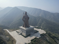 The statue of Guan Gong, the world's tallest saint, is seen under mist in Yuncheng, China, on October 14, 2024. (