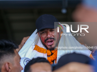 Record-setting climber Nirmal Purja, also known as Nimsdai, arrives back in Kathmandu, Nepal, on October 14, 2024, after completing the summ...