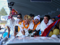 Record-setting climber Nirmal Purja, also known as Nimsdai, cheers as he arrives back in Kathmandu, Nepal, on October 14, 2024, after comple...