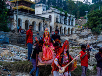 Hindu devotees immerse an idol of the Hindu goddess Durga into the Bagmati River in Kathmandu, Nepal, on October 14, 2024. In Hindu mytholog...