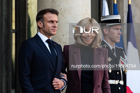 French President Emmanuel Macron and First Lady Brigitte receive King Philippe of the Belgians and Queen Mathilde at the Elysee Palace in Pa...