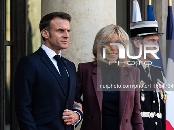 French President Emmanuel Macron and First Lady Brigitte receive King Philippe of the Belgians and Queen Mathilde at the Elysee Palace in Pa...