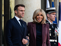 French President Emmanuel Macron and First Lady Brigitte receive King Philippe of the Belgians and Queen Mathilde at the Elysee Palace in Pa...