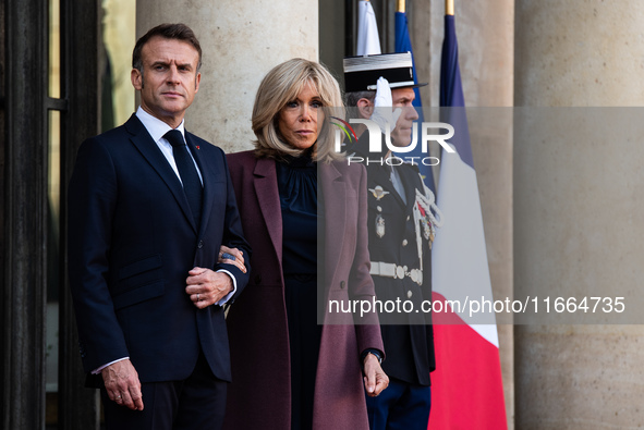 French President Emmanuel Macron and First Lady Brigitte receive King Philippe of the Belgians and Queen Mathilde at the Elysee Palace in Pa...