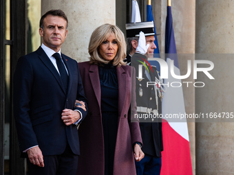 French President Emmanuel Macron and First Lady Brigitte receive King Philippe of the Belgians and Queen Mathilde at the Elysee Palace in Pa...