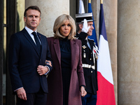 French President Emmanuel Macron and First Lady Brigitte receive King Philippe of the Belgians and Queen Mathilde at the Elysee Palace in Pa...