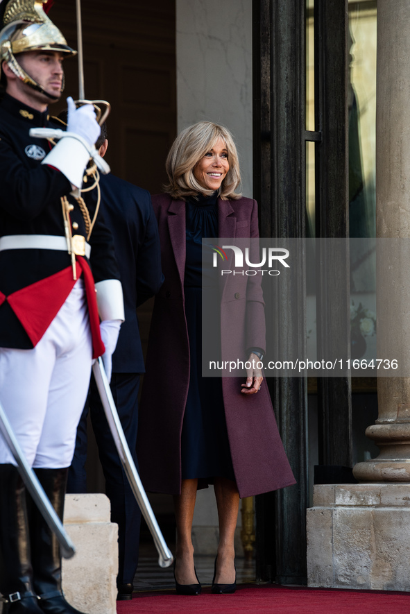 French President Emmanuel Macron and First Lady Brigitte receive King Philippe of the Belgians and Queen Mathilde at the Elysee Palace in Pa...