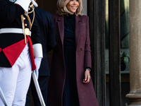 French President Emmanuel Macron and First Lady Brigitte receive King Philippe of the Belgians and Queen Mathilde at the Elysee Palace in Pa...