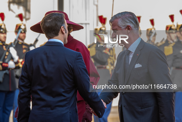 French President Emmanuel Macron and First Lady Brigitte receive King Philippe of the Belgians and Queen Mathilde at the Elysee Palace in Pa...