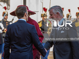 French President Emmanuel Macron and First Lady Brigitte receive King Philippe of the Belgians and Queen Mathilde at the Elysee Palace in Pa...