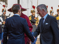 French President Emmanuel Macron and First Lady Brigitte receive King Philippe of the Belgians and Queen Mathilde at the Elysee Palace in Pa...