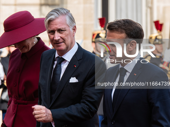 French President Emmanuel Macron and First Lady Brigitte receive King Philippe of the Belgians and Queen Mathilde at the Elysee Palace in Pa...