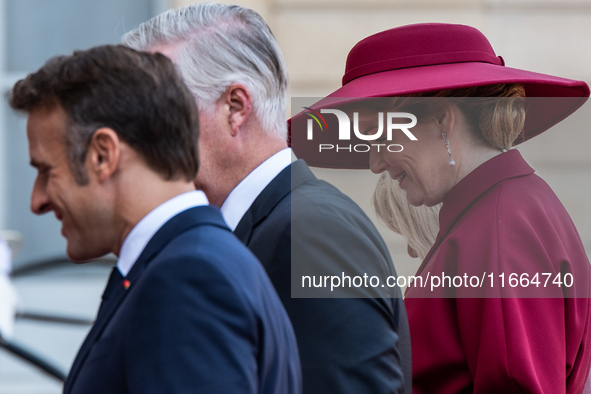 French President Emmanuel Macron and First Lady Brigitte receive King Philippe of the Belgians and Queen Mathilde at the Elysee Palace in Pa...