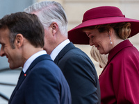 French President Emmanuel Macron and First Lady Brigitte receive King Philippe of the Belgians and Queen Mathilde at the Elysee Palace in Pa...