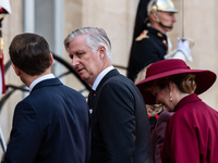 French President Emmanuel Macron and First Lady Brigitte receive King Philippe of the Belgians and Queen Mathilde at the Elysee Palace in Pa...