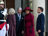 French President Emmanuel Macron and First Lady Brigitte receive King Philippe of the Belgians and Queen Mathilde at the Elysee Palace in Pa...