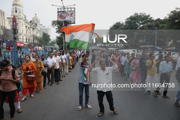 Doctors and citizens shout slogans during a protest march demanding that India's West Bengal state government provide better security measur...