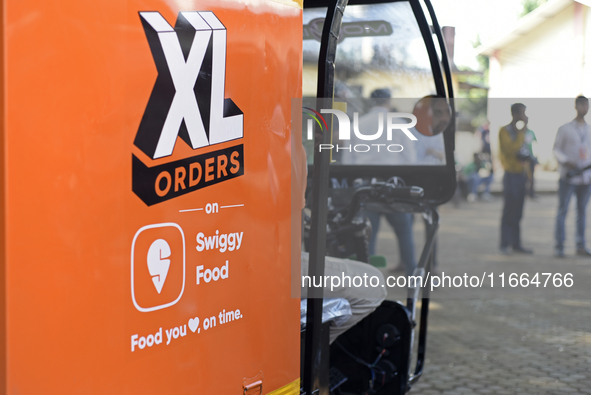 XL Swiggy branding is seen during a promotional event in Mumbai, India, on October 14, 2024. IPO-bound Swiggy launches an XL fleet to cater...