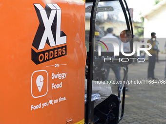 XL Swiggy branding is seen during a promotional event in Mumbai, India, on October 14, 2024. IPO-bound Swiggy launches an XL fleet to cater...