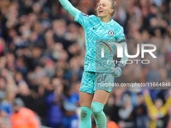 Chelsea goalkeeper Hannah Hampton celebrates in front of the Arsenal fans after the Barclays FA Women's Super League match between Arsenal a...