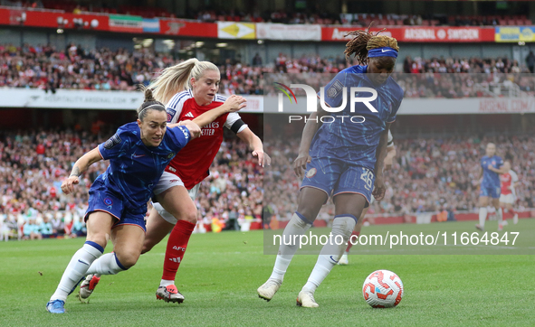 Kadeisha Buchanan of Chelsea beats Alessia Russo to the ball during the Barclays FA Women's Super League match between Arsenal and Chelsea a...