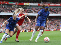 Kadeisha Buchanan of Chelsea beats Alessia Russo to the ball during the Barclays FA Women's Super League match between Arsenal and Chelsea a...