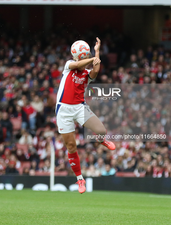 Arsenal's Katie McCabe jumps for the ball during the Barclays FA Women's Super League match between Arsenal and Chelsea at the Emirates Stad...