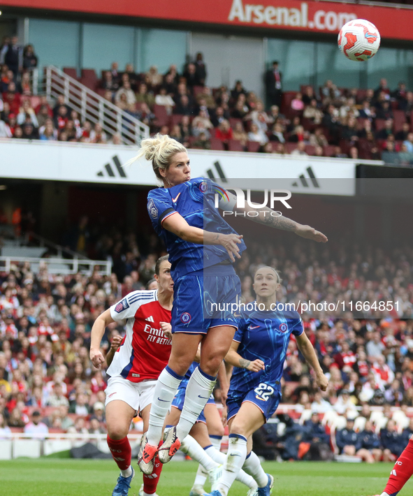 Millie Bright of Chelsea jumps for the ball during the Barclays FA Women's Super League match between Arsenal and Chelsea at the Emirates St...