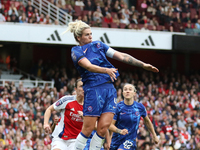 Millie Bright of Chelsea jumps for the ball during the Barclays FA Women's Super League match between Arsenal and Chelsea at the Emirates St...