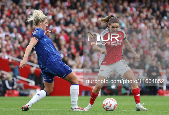 Chelsea's Millie Bright challenges Arsenal's Mariona Caldentey for the ball during the Barclays FA Women's Super League match between Arsena...