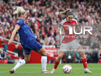 Chelsea's Millie Bright challenges Arsenal's Mariona Caldentey for the ball during the Barclays FA Women's Super League match between Arsena...