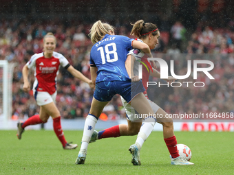 Chelsea's Lucy Bronze tackles Arsenal's Mariona Caldentey during the Barclays FA Women's Super League match between Arsenal and Chelsea at t...