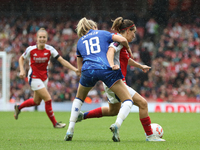 Chelsea's Lucy Bronze tackles Arsenal's Mariona Caldentey during the Barclays FA Women's Super League match between Arsenal and Chelsea at t...