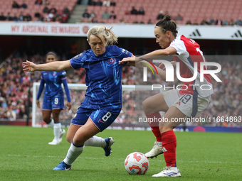 Erin Cuthbert of Chelsea fights Caitlin Foord for the ball during the Barclays FA Women's Super League match between Arsenal and Chelsea at...