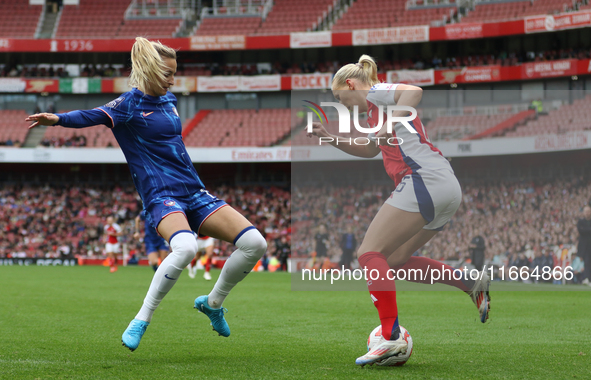 Chelsea substitute Nathalie Bjorn chases down Arsenal substitute Stina Blackstenius during the Barclays FA Women's Super League match betwee...