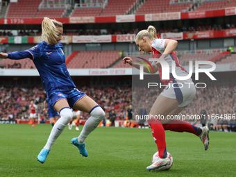 Chelsea substitute Nathalie Bjorn chases down Arsenal substitute Stina Blackstenius during the Barclays FA Women's Super League match betwee...