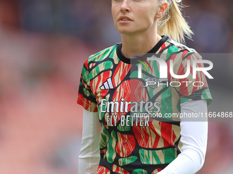 Leah Williamson of Arsenal warms up before the Barclays FA Women's Super League match between Arsenal and Chelsea at the Emirates Stadium in...