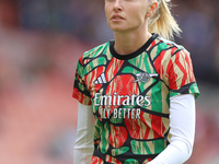 Leah Williamson of Arsenal warms up before the Barclays FA Women's Super League match between Arsenal and Chelsea at the Emirates Stadium in...