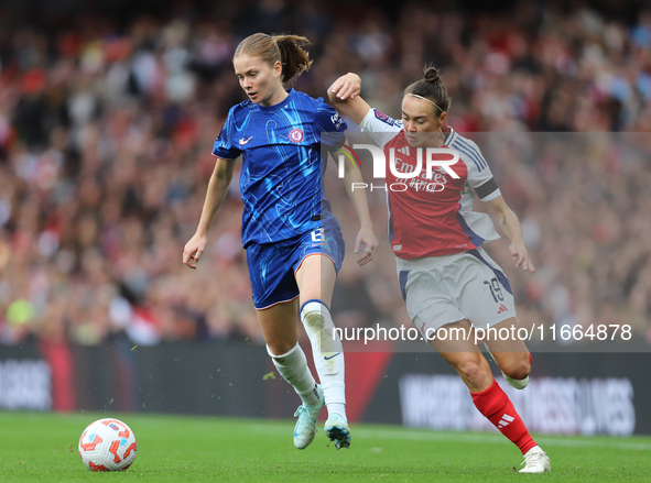 Caitlin Foord of Arsenal chases Chelsea's Sjoeke Nusken during the Barclays FA Women's Super League match between Arsenal and Chelsea at the...